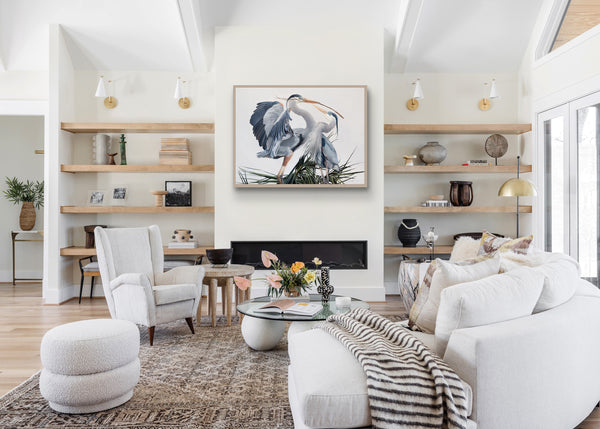 A canvas print featuring two great blue herons in an elegant pose, building a nest with detailed feathering and a contemporary background by wildlife artist James Corwin oil painting. Hanging in living room wall art home decor.