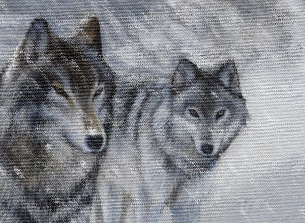 A limited edition giclee canvas print featuring a group of wolves in a snowy mountain landscape. The print is gallery-wrapped by wildlife artist James Corwin.