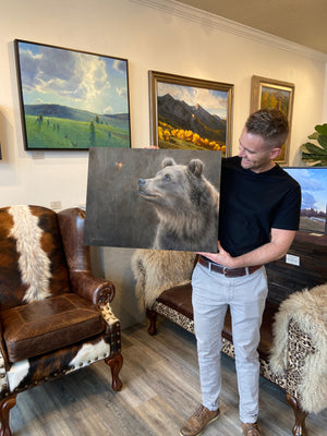 An oil painting of a grizzly bear looking at a rufous hummingbird as a limited edition giclee canvas print by wildlife artist James Corwin.