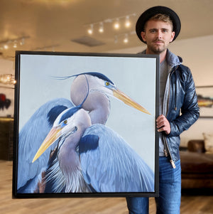 A canvas print of two great blue herons with a gray, blue, and yellow color palette. An oil painting by wildlife artist James Corwin.