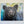Bumblebee Bear by wildlife artist James Corwin. A Painting of a black bear with a colorful textured background. Wall art for home decor.