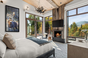 A whitetail buck and pheasant oil painting as a limited edition print on canvas by wildlife artist James Corwin. Hanging in western bedroom wall art home decor.