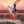 A canvas print from an oil painting featuring a dancing sandhill crane in mid-flight against a backdrop of a setting sun and a full moon in a colorful wetland. Wildlife art by James Corwin artist.