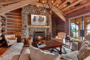 A western art print featuring a group of wild horses running galloping in a dusty field by wildlife artist James Corwin. Hanging in living room wall art home decor.