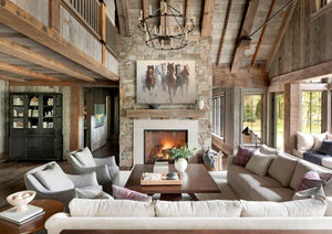 A western art print featuring a group of wild horses running galloping in a dusty field by wildlife artist James Corwin.