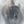 A canvas print depicting a herd of Yellowstone bison in a misty snowy landscape. Oil painting artwork 'Giants in the Mist IV' by wildlife artist James Corwin.