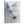 A canvas print featuring a wolf in snow, with a blurred background by wildlife artist James Corwin.