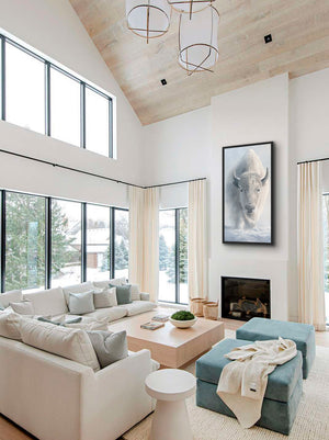 An oil painting of the sacred white bison as a limited edition canvas print by wildlife artist James Corwin based in Montana. Native American art inspired. Hanging in living room home decor wall art.