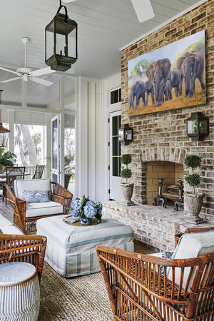 African elephants in a herd with egrets oil painting as a limited edition canvas print by wildlife artist James Corwin. Hanging in living room wall art home decor.